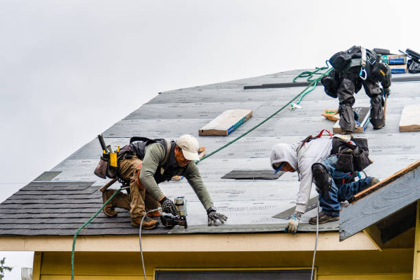 Professional Roofing technician working in Mc Veytown, PA